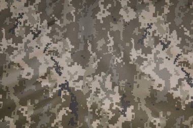 Arka plan olarak kamuflaj kumaşının dokusu, üst görünüm