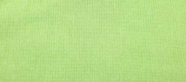 Açık yeşil kumaşın arka plan olarak dokusu, üst görünüm