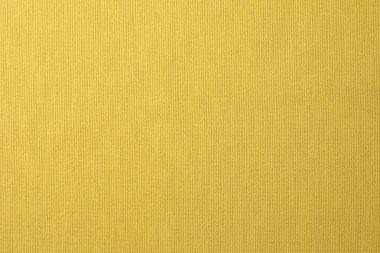 Arkaplan olarak sarı kumaşın dokusu, üst görünüm