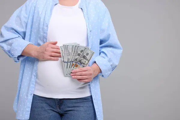 Surrogate Mother Pregnant Woman Dollar Banknotes Light Grey Background Closeup — Stock Photo, Image