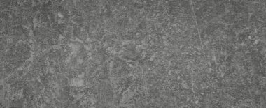 Çimento yüzeyi arka plan olarak desenlendirmiş. Pankart tasarımı