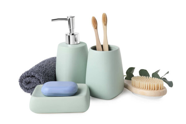 Bath accessories. Set of different personal care products and eucalyptus leaves isolated on white