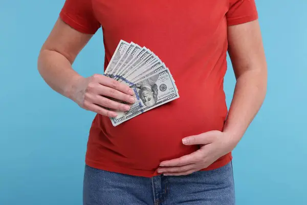 Surrogate Mother Pregnant Woman Dollar Banknotes Light Blue Background Closeup — Stock Photo, Image