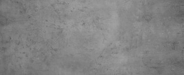 Çimento yüzeyi arka plan olarak desenlendirmiş. Pankart tasarımı