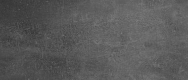 Çimento yüzeyi arka plan olarak desenlendirmiş. Pankart tasarımı