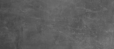 Çimento yüzeyi arka plan olarak desenlendirmiş. Pankart tasarımı