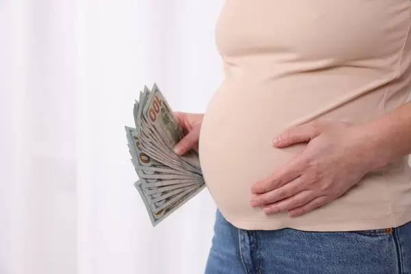 Surrogate Mother Pregnant Woman Dollar Banknotes Indoors Closeup Space Text — Stock Photo, Image