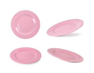 Boş seramik tabak beyaz üzerine izole edilmiş, farklı görünümlü.