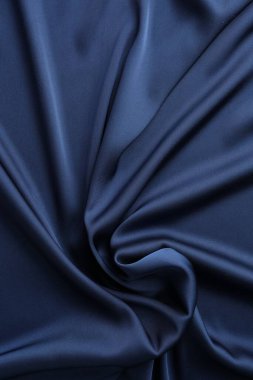 Arkaplan olarak mavi buruşmuş ipek kumaş dokusu, üst görünüm