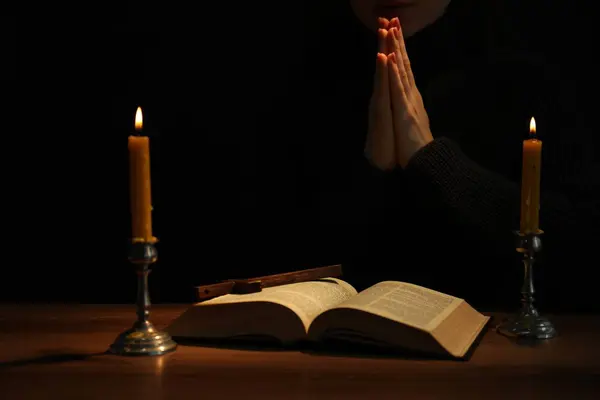 Woman Praying Table Burning Candles Bible Closeup — Stock Photo, Image
