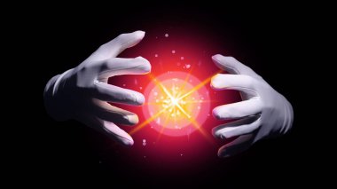 Sihirbaz siyah arka planda sihirbazlık numarası yapıyor, yakın plan