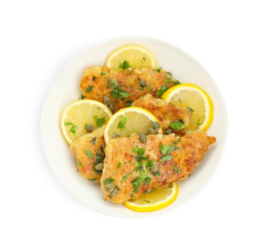Delicious chicken piccata with herbs isolated on white, top view clipart