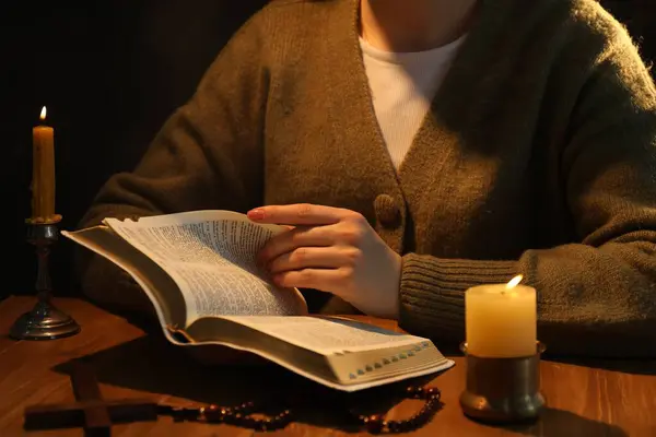 Woman Reading Bible Table Burning Candles Closeup — Stock Photo, Image