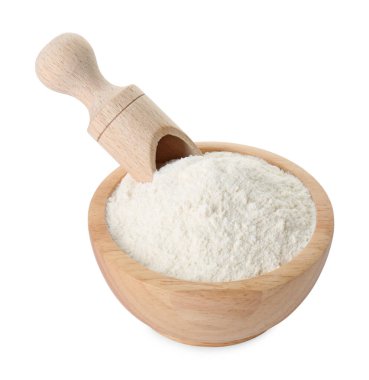 Kabın içindeki kabartma tozu ve beyazın üzerindeki kepçe.