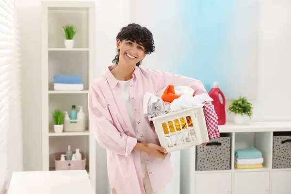 Happy Woman Laundry Basket Full Clothes Indoors — Stock Photo, Image