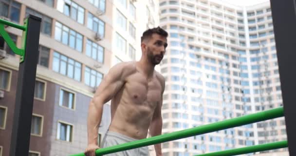 Muscular Man Doing Dips Outdoor Gym Low Angle View Camera — Stock Video