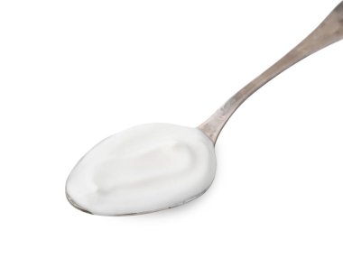 Beyaz kaşık içinde nefis bir yoğurt.