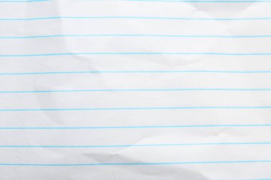 Arkaplan olarak buruşuk çizgili defter sayfası, üst görünüm