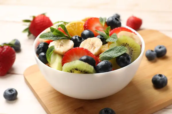 Tasty Fruit Salad Bowl Ingredients Wooden Table Closeup — Stock Photo, Image