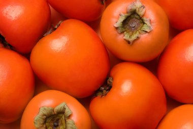 Arka plan olarak lezzetli sulu hurmalar, üst görünüm