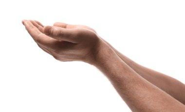 Din. Avuçları açık beyaz arka planda dua eden adam, yakın plan.