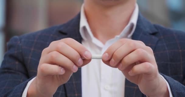 Man Breaks Cigarette Quits Smoking Outdoors Closeup — Stock Video