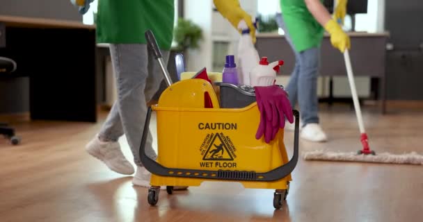 Janitors Working Office Focus Bucket Supplies Cleaning Service — Stock Video