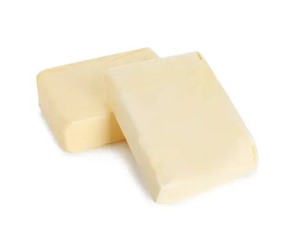 白で分離されたおいしいバターのブロック — ストック写真
