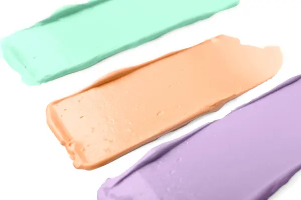 Strokes Pink Green Purple Color Correcting Concealers White Background Closeup — Stock Photo, Image