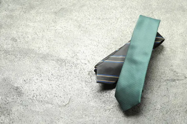 Two Neckties Grey Textured Background Top View Space Text — Stock Photo, Image