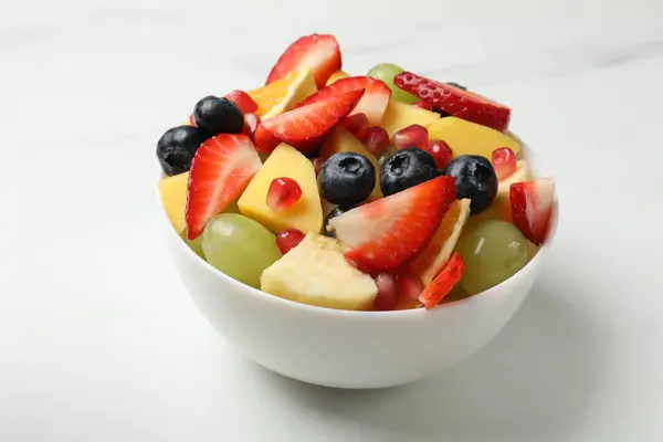 Tasty Fruit Salad Bowl White Table Closeup — Stock Photo, Image