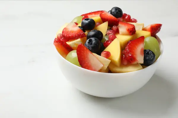 Tasty Fruit Salad Bowl White Table Closeup — Stock Photo, Image