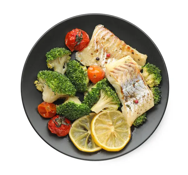 Tasty cod cooked with vegetables isolated on white, top view