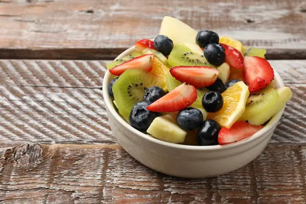 Tasty Fruit Salad Bowl Wooden Table Closeup Space Text — Stock Photo, Image