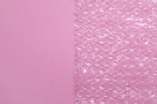 Embrulho Bolha Transparente Sobre Fundo Rosa Vista Superior Espaço Para — Fotografia de Stock