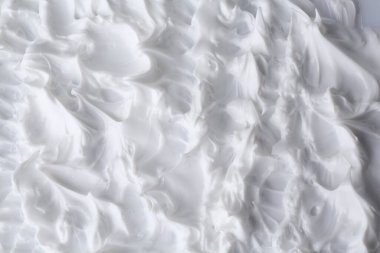 Arka plan olarak vücut bakım kreminin dokusu, üst görünüm