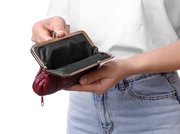 Poor woman with empty wallet on white background, closeup