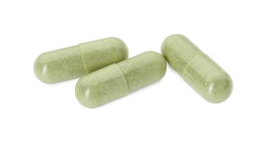 Beyaza izole edilmiş vitamin kapsülleri. Sağlık takviyesi