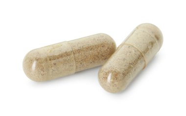 Beyaza izole edilmiş vitamin kapsülleri. Sağlık takviyesi