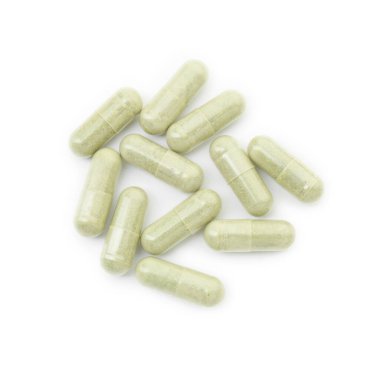 Vitamin kapsülleri beyaz, üst görünümde izole edilmiş. Sağlık takviyesi