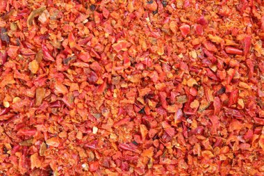 Aromatik baharat. Arka plan olarak kırmızı biber taneleri, üst görünüm