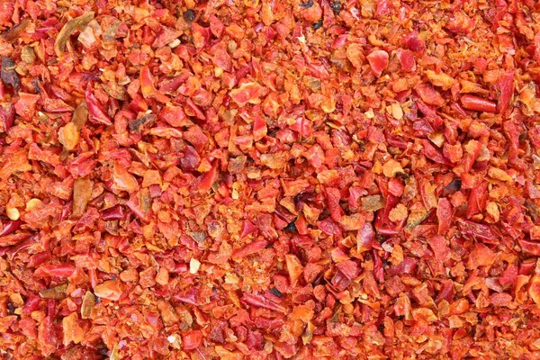 Aromatik baharat. Arka plan olarak kırmızı biber taneleri, üst görünüm