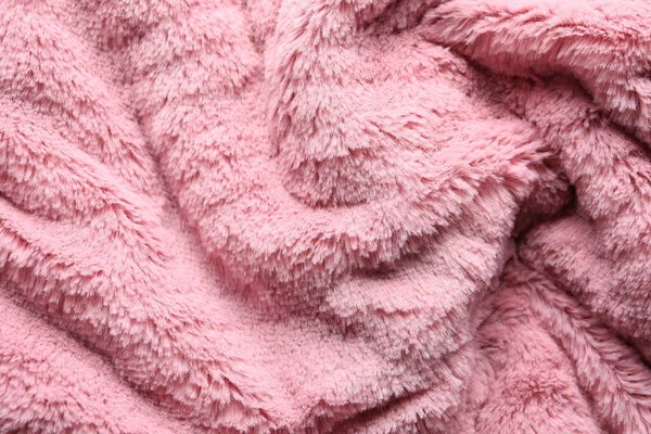Текстура розовый искусственный мех в качестве фона, крупным планом