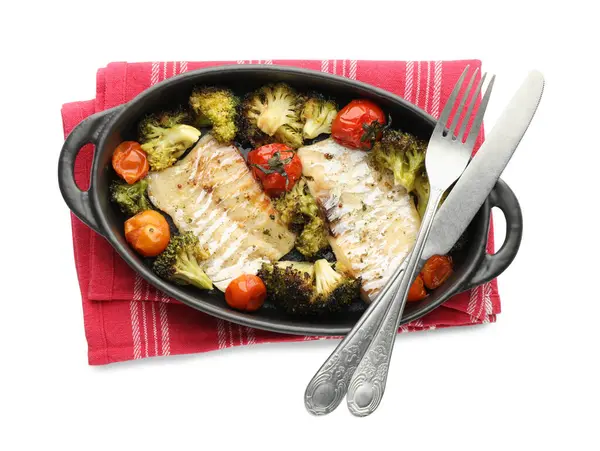 Tasty cod cooked with vegetables and cutlery isolated on white, top view
