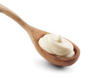 Beyaz kaşık içinde doğal yoğurt.