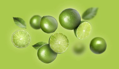 Açık yeşil arka planda taze taze limonlar