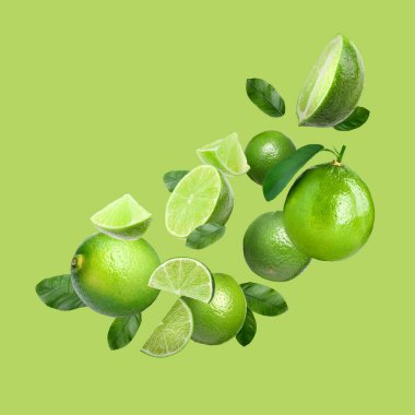 Açık yeşil arka planda taze taze limonlar