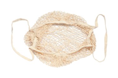 Üst görüntüde izole edilmiş bej renkli bir torba.