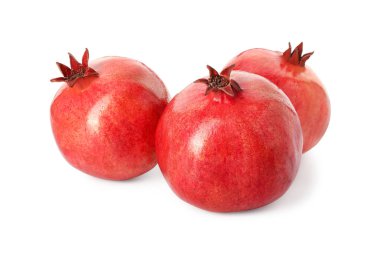 Pek çok taze nar beyazda izole olur.