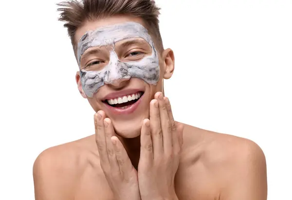 Schöner Mann Mit Tonmaske Auf Dem Gesicht Vor Weißem Hintergrund lizenzfreie Stockbilder